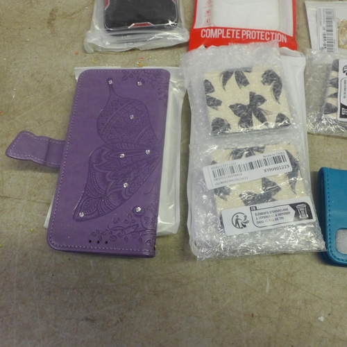 5098 - A quantity of miscellaneous items including phone cases, bracelets, watches, napkin rings, other sof... 