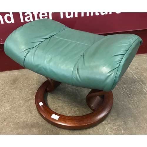 79 - A Norwegian Ekornes Stressless green leather footstool