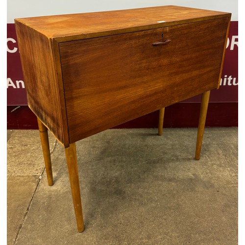 81 - A teak record cabinet