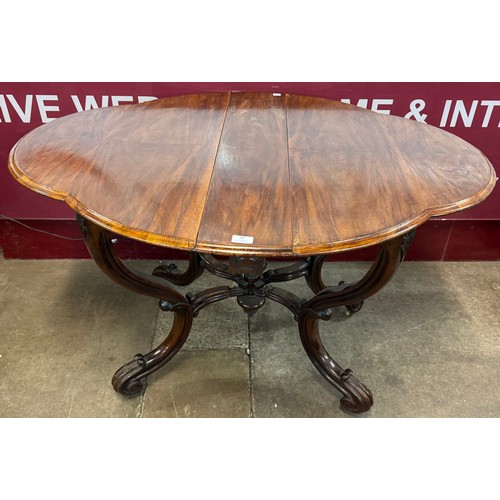 98 - A Victorian rosewood Sutherland table