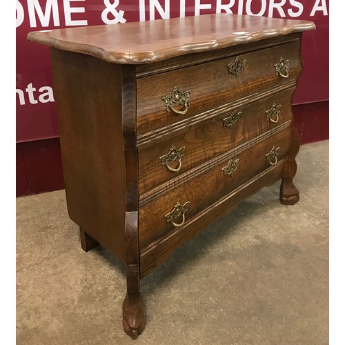 100 - A 19th Century Dutch style bombe shaped petit commode