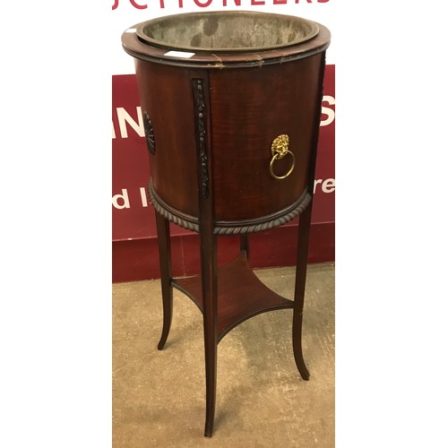 103 - An Edward VII mahogany wine cooler on stand