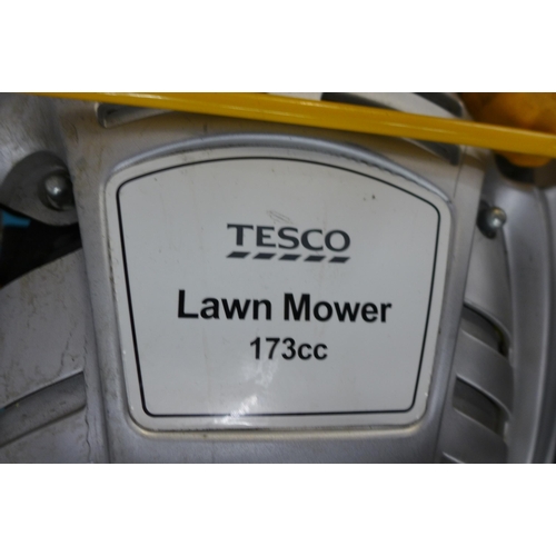 5239 - A Tesco 173cc petrol driven lawn mower with collection box *Police repossession
