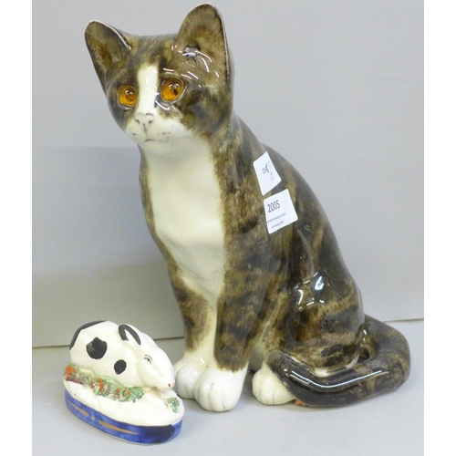 2005 - A Winstanley model cat, signed Mike Hinton, 23.5cm, and a Staffordshire rabbit