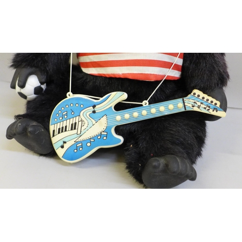 2006 - A novelty Magogo musical football chant gorilla toy, 27cm