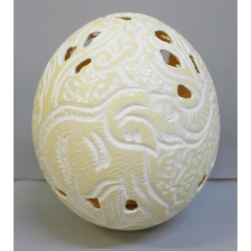 2018 - A decorative carved ostrich egg