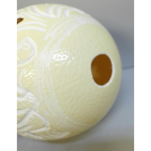 2018 - A decorative carved ostrich egg