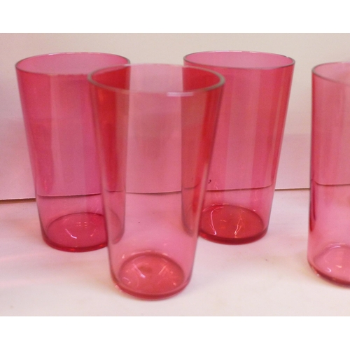 2026 - A cranberry glass jug and six cranberry glass tumblers, (3+3)