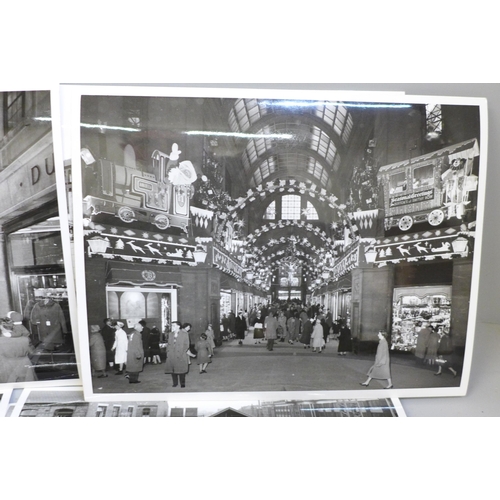 2028 - Nottingham local history, a collection of black and white photographs of the Council House shops and... 