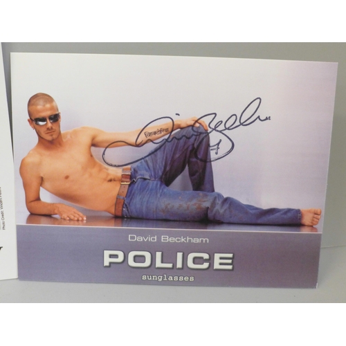 2039 - A signed David Beckham Police sunglasses postcard and a signed Victoria Beckham picture