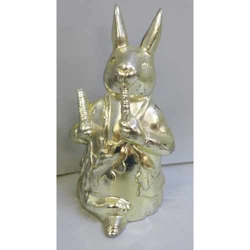 2040 - A French ice cream mould, a small hip flask and a novelty plated money box in the form of a rabbit