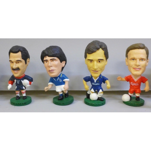 2056 - Thirty-four Corinthian collectable plastic football player figures and a Euro 2000 player figure