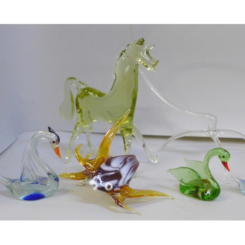 2068 - A collection of mainly miniature glass animal figures, some larger and a model ship, approximately t... 