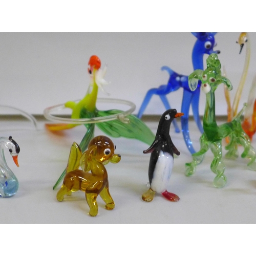 2068 - A collection of mainly miniature glass animal figures, some larger and a model ship, approximately t... 