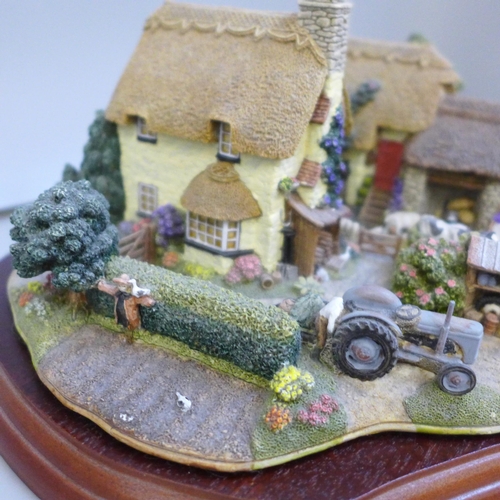 2070 - A Limited Edition Lilliput Lane 'We Plough The Fields & Scatter', with box, deeds and stand, 0445