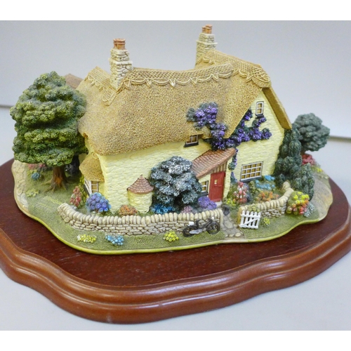 2070 - A Limited Edition Lilliput Lane 'We Plough The Fields & Scatter', with box, deeds and stand, 0445