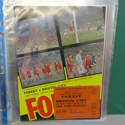 2097 - Football memorabilia; an album of 24 Nottingham Forest match tickets, home and away, six with match ... 