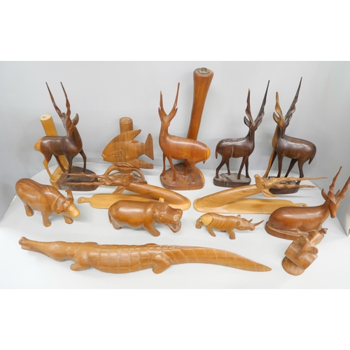 2119 - A collection of wood carvings, including African tourist pieces