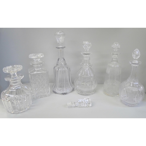 2122 - A collection of five glass decanters with stoppers, including 19th Century, one other decanter witho... 