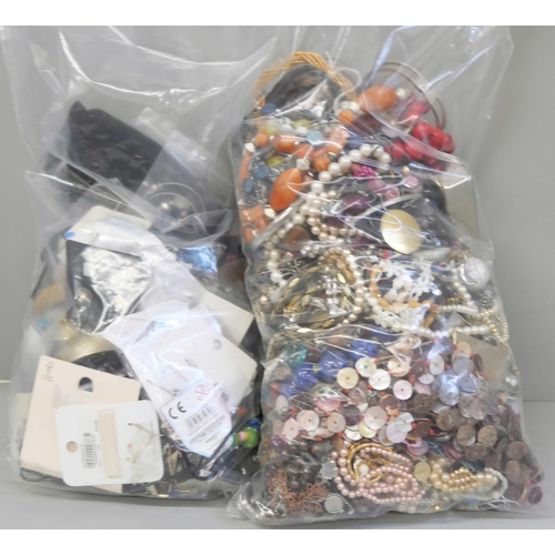 2127 - A collection of new costume jewellery, (two bags)