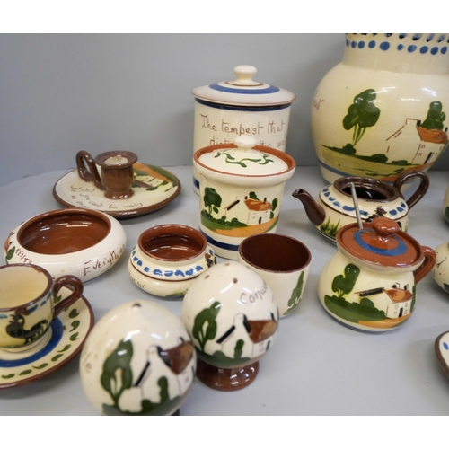 2130 - A ceramic tea service with seagull detail and a collection of motto ware pottery including a large j... 