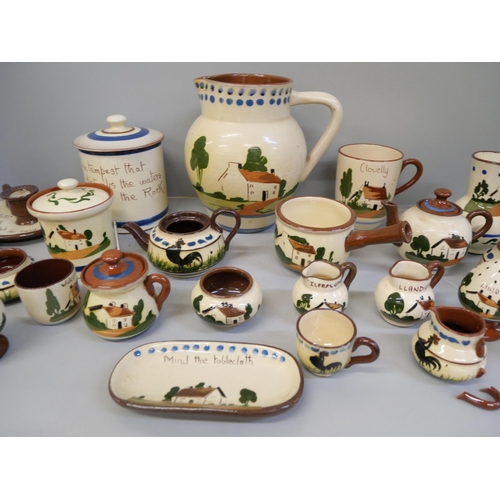 2130 - A ceramic tea service with seagull detail and a collection of motto ware pottery including a large j... 