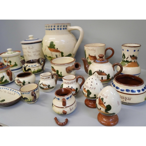 2130 - A ceramic tea service with seagull detail and a collection of motto ware pottery including a large j... 