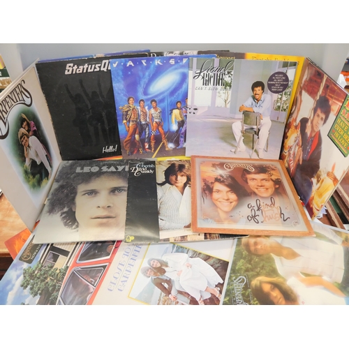 2131 - Forty-eight LP records including Rod Stewart, Moody Blues, Billie Holiday and Status Quo