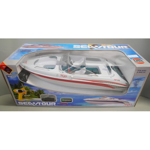 2133 - Two High Speed remote controlled boats, Mosquito Craft and a Seatour remote controlled model boat, a... 