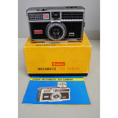 2159 - A Kodak EK160-EF instant camera and a Kodak 304 Instamatic camera, both boxed