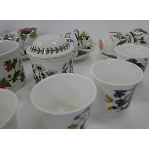 2177 - A large collection of Portmeirion kitchenware comprising sets of tea cups and saucers, coffee cups, ... 