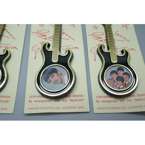 2194 - A set of five The Beatles guitar brooches