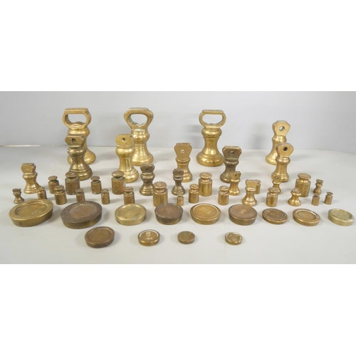 2209 - Various sets of brass weights including 16 bell weights