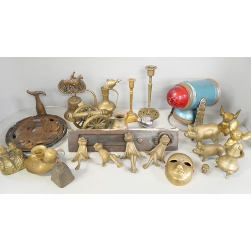 2239 - A collection of brass to include models of pigs, candlesticks, mice, bell, trivet, letterbox,etc., t... 