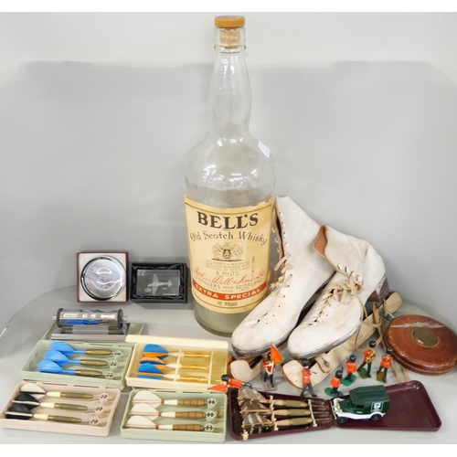 2258 - A box of assorted items to include ice skates, small stool, large Bell's scotch whiskey bottle, embr... 