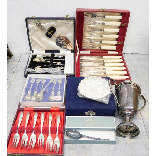 2260 - A large collection of silver plated items to include cutlery, lidded pots, jugs, two oil lamps and o... 