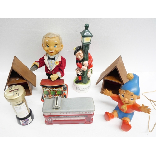 2271 - A collection of novelty items including a Japanese bartender figure, Noddy lamp, Scottish music figu... 