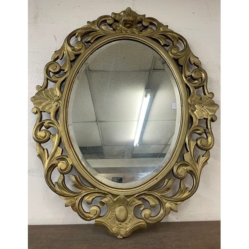 282 - A French style gilt framed oval mirror