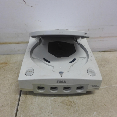 5105 - A quantity of retro games equipment including a Sega Dreamcast model HKT-3030 games console with 2 w... 