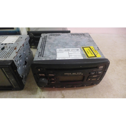 5148 - A large quantity of assorted car stereos including Pioneer, Ford, Jaguar, Siemens, Sony, etc.