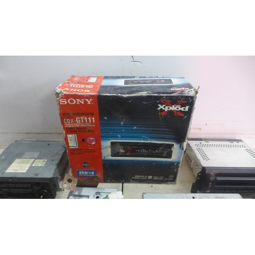 5148 - A large quantity of assorted car stereos including Pioneer, Ford, Jaguar, Siemens, Sony, etc.