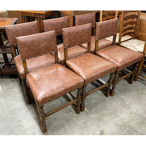 170 - A set of six early 20th Century oak and faux leather upholstered dining chairs