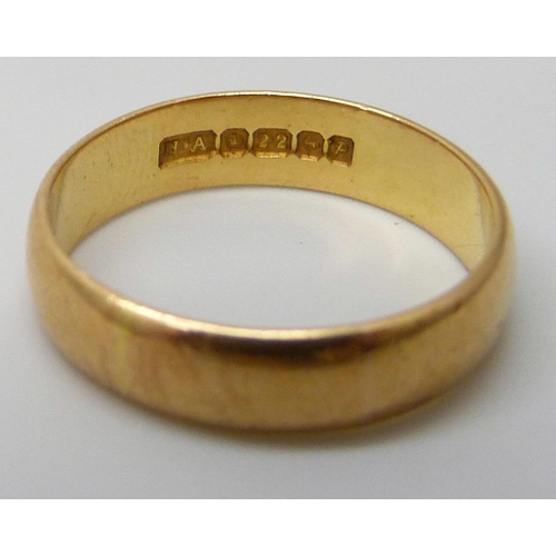 7001 - Two 22ct gold wedding rings, 4.1g, L and 4.3g, O