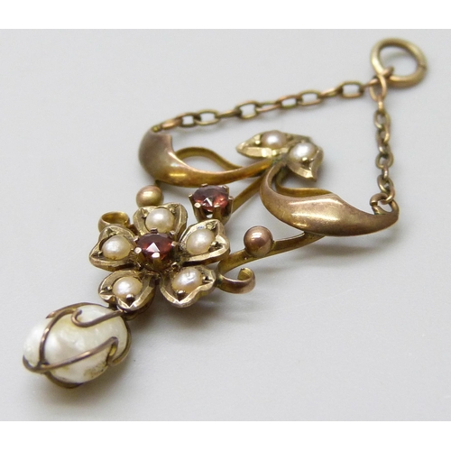 7002 - An Art Nouveau 9ct gold, pearl and garnet pendant, 2g, 4.3cm