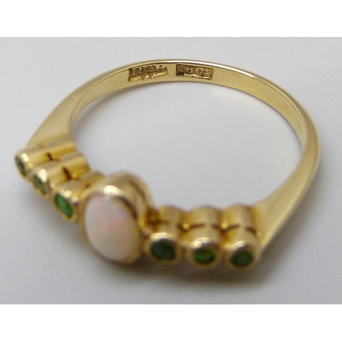 7017 - An early 20th Century 18ct yellow gold opal and Demantoid garnet ring, 2.6g, M