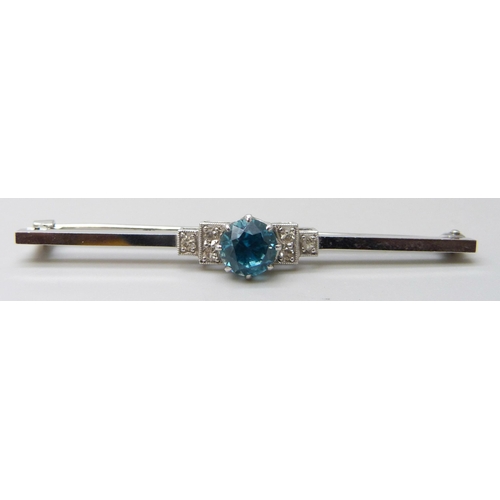 7026 - An Art Deco 14ct gold and platinum set topaz and diamond brooch, 4g, 5.4cm