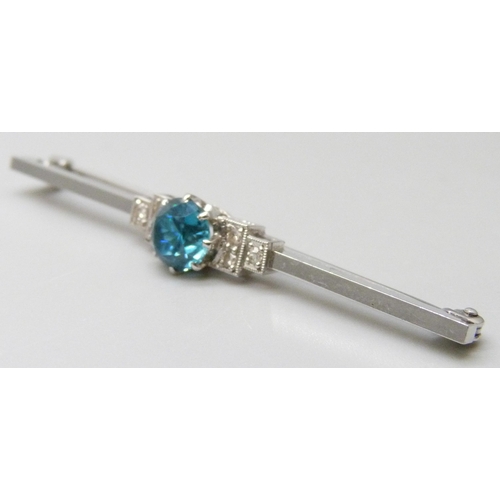 7026 - An Art Deco 14ct gold and platinum set topaz and diamond brooch, 4g, 5.4cm