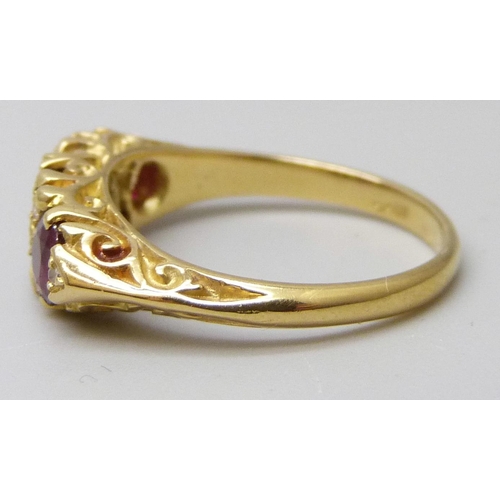 7032 - A yellow metal, ruby and diamond ring, 4.1g, L/M