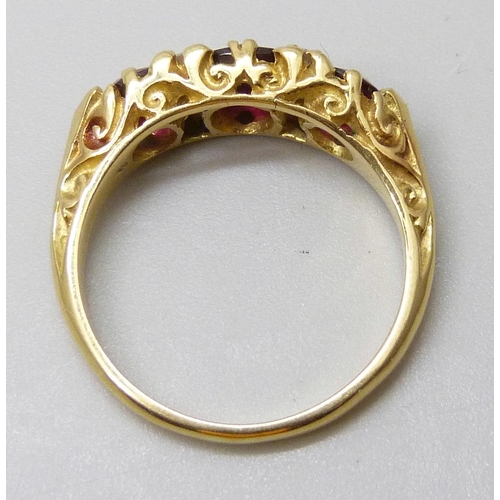 7032 - A yellow metal, ruby and diamond ring, 4.1g, L/M