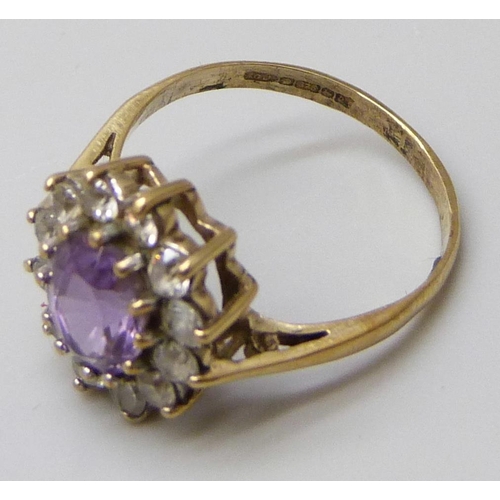 7046 - A 9ct gold, amethyst and cubic zirconia cluster ring, 2.4g, M